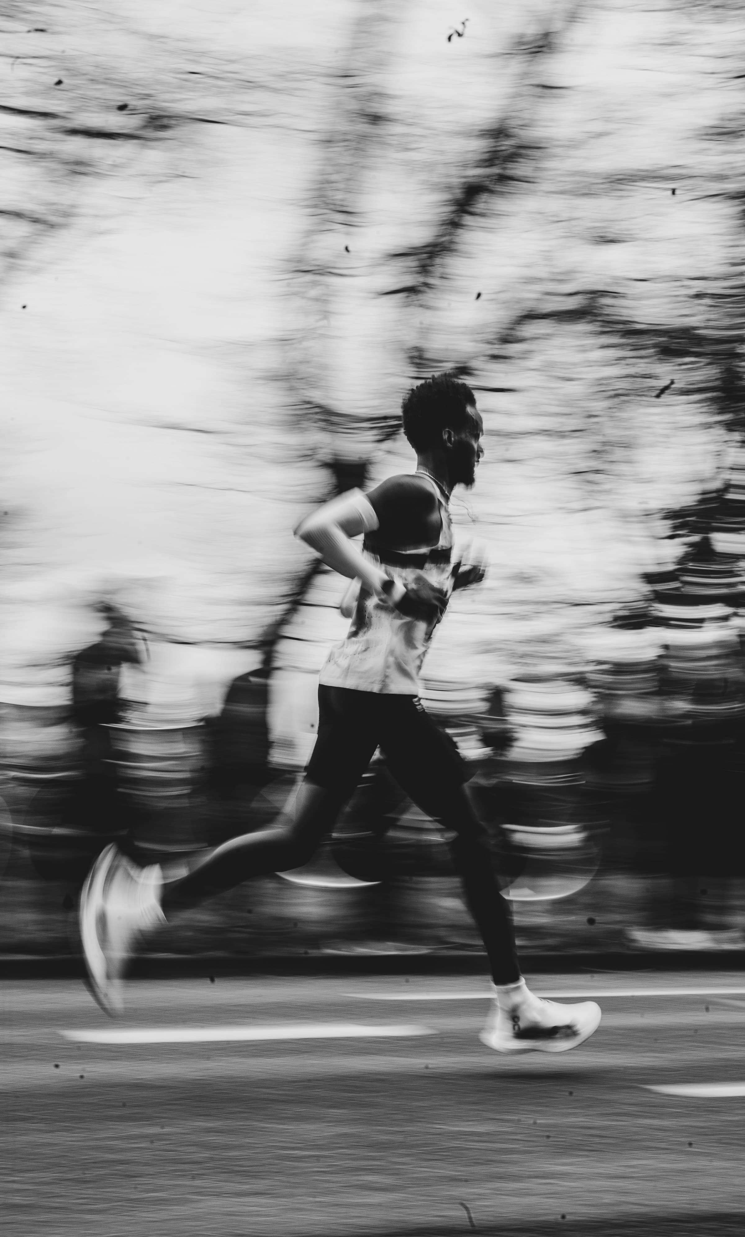 Runner mid-stride captured in motion blur
